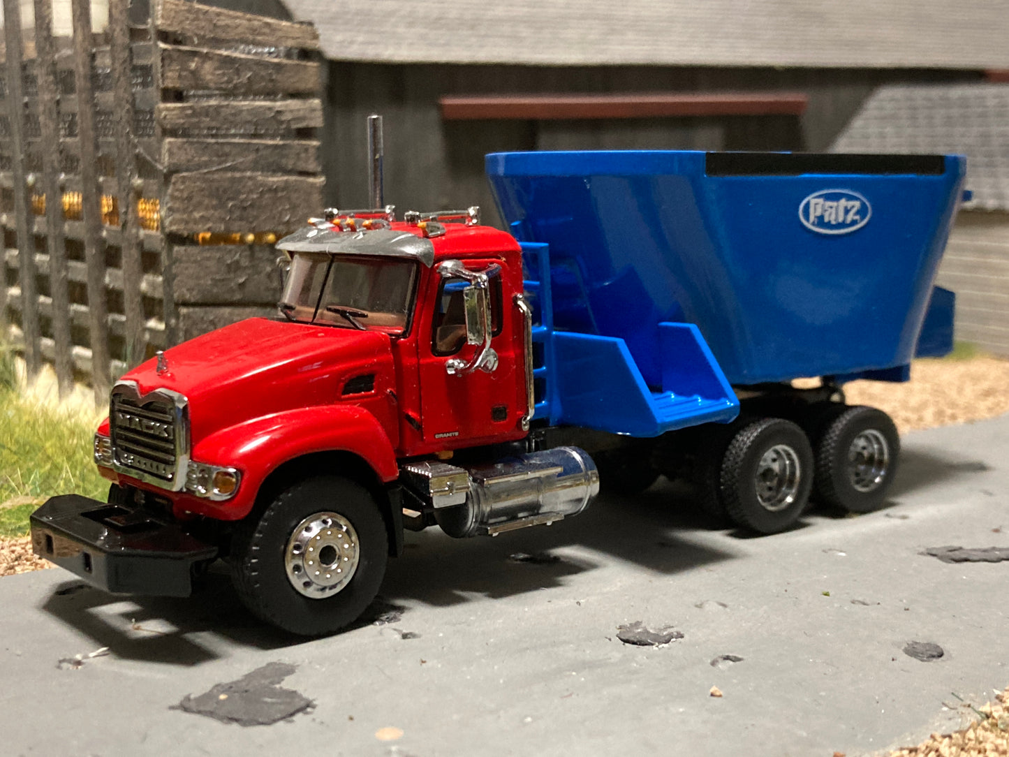 1/64 Vertical Feed Twin Triple Screw Blue on Mack Granite Truck