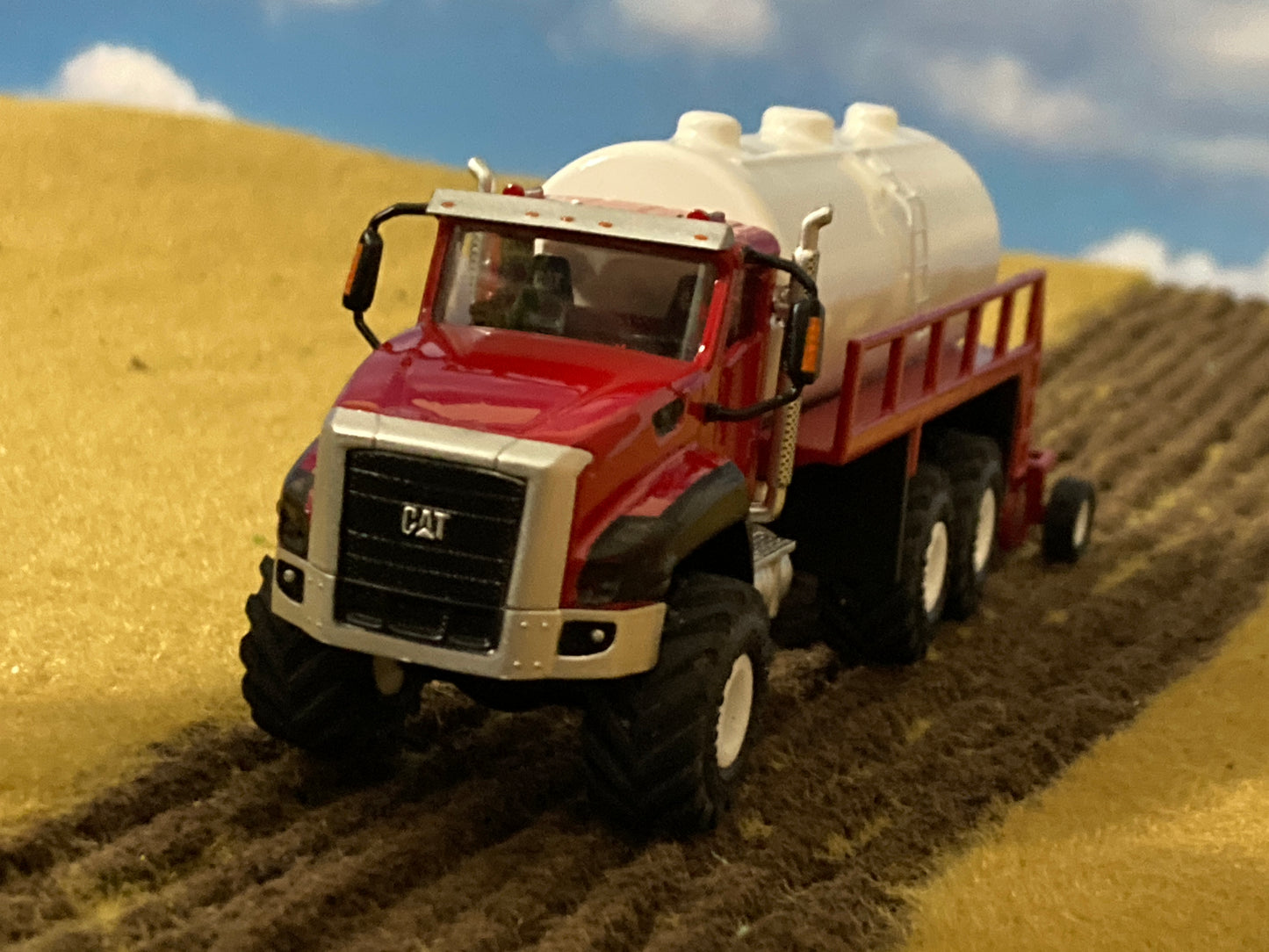 1/64 Cat CT660 Stahly Manure Injector Truck