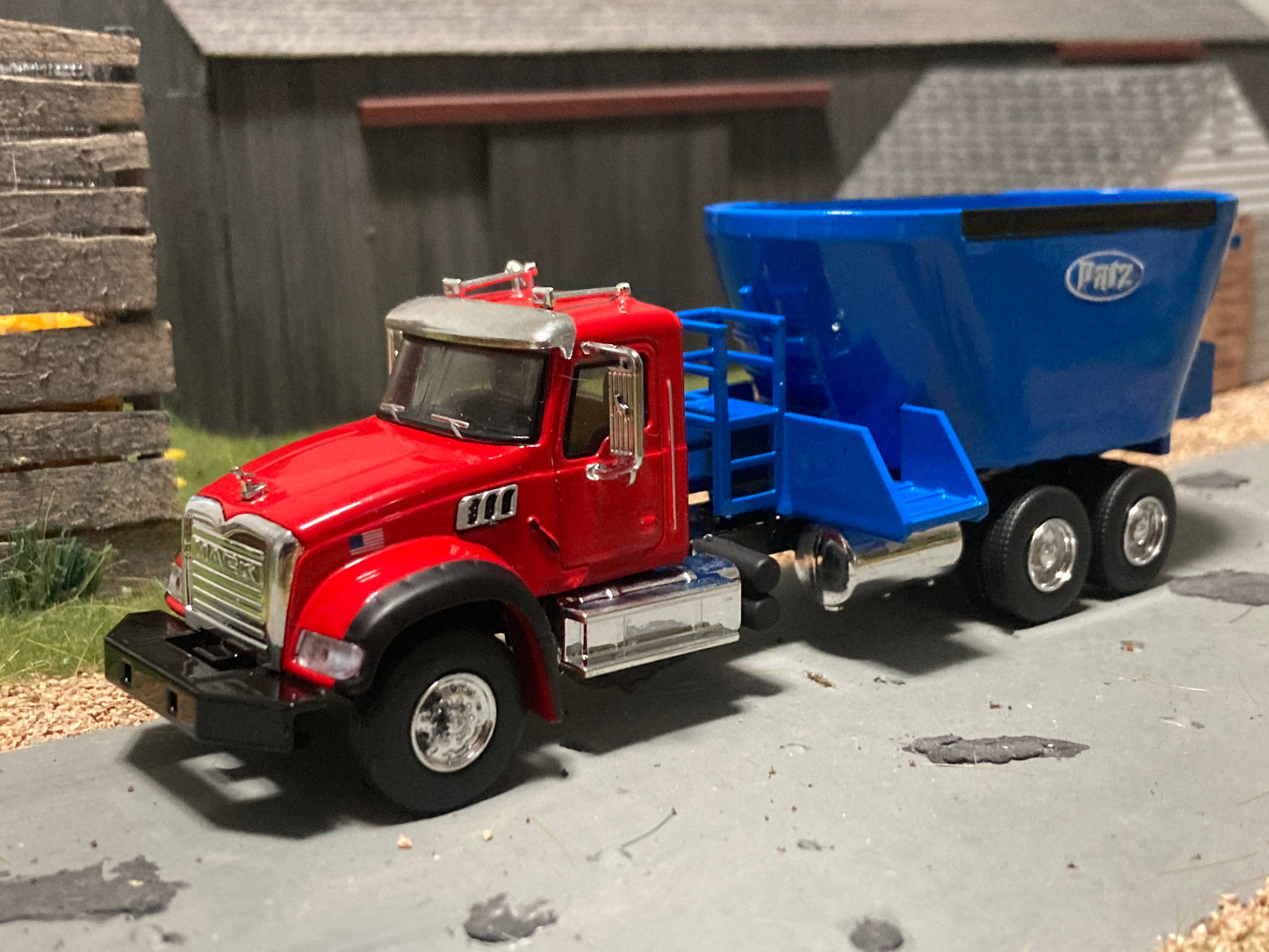 1/64 Vertical Feed Twin Screw Blue on Red Mack Granite Truck