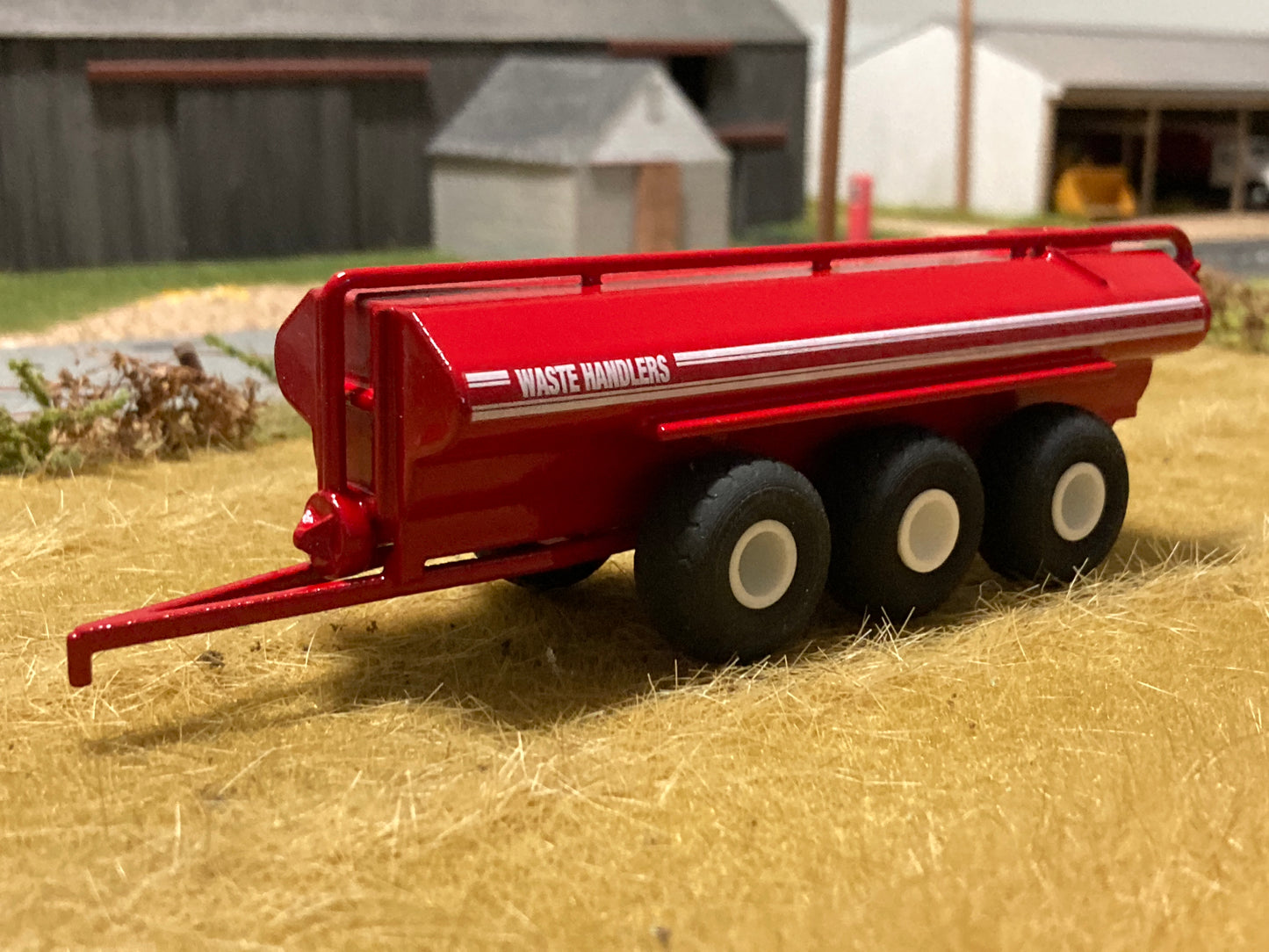 1/64 Waste Handler Manure Spreader 7,300 gallon Tri Axle