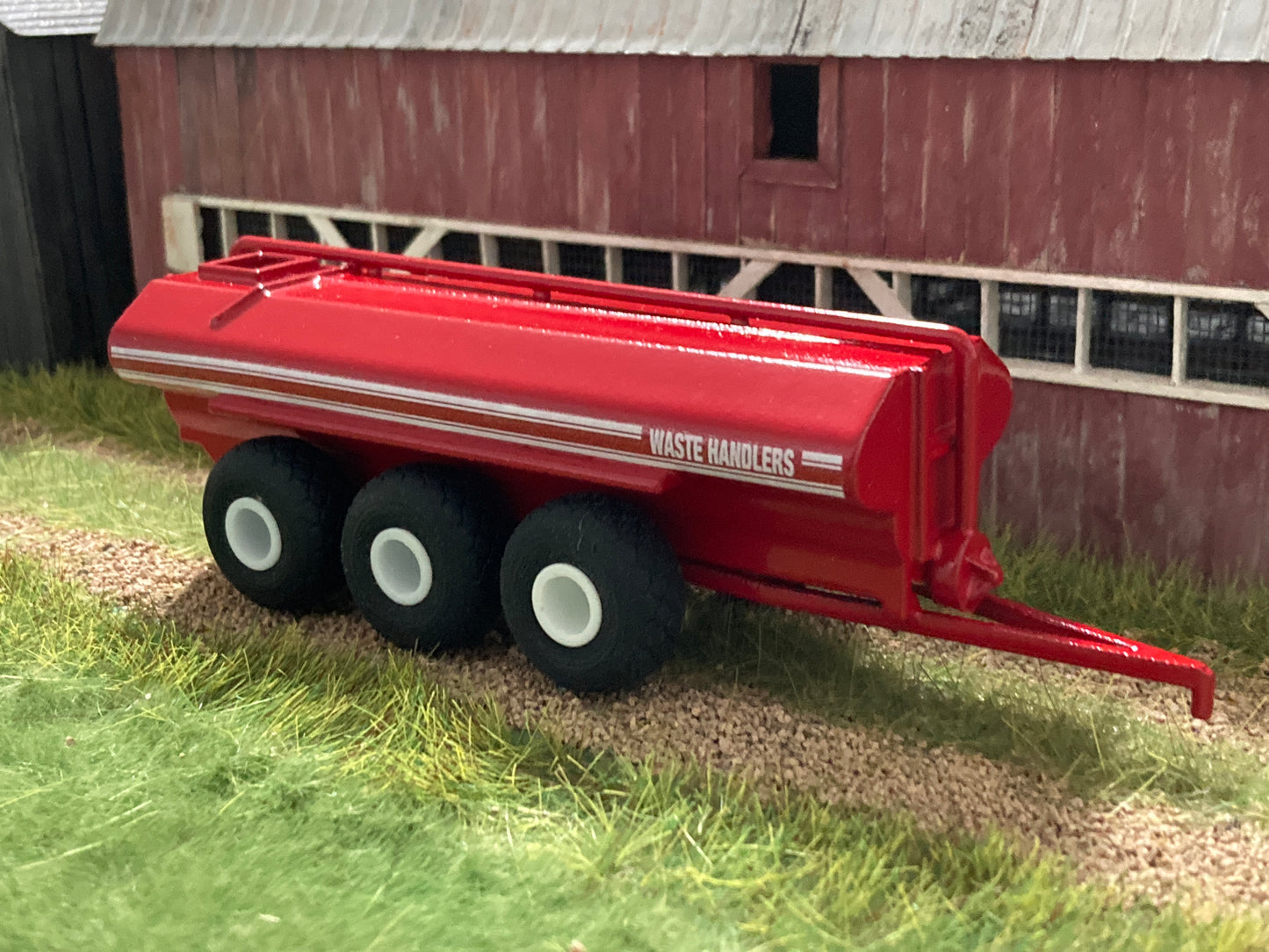 1/64 Waste Handler Manure Spreader 7,300 gallon Tri Axle