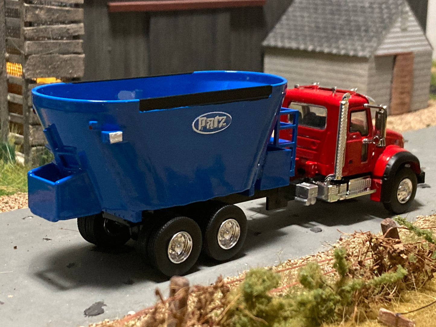 1/64 Vertical Feed Twin Screw Blue on Red Mack Granite Truck
